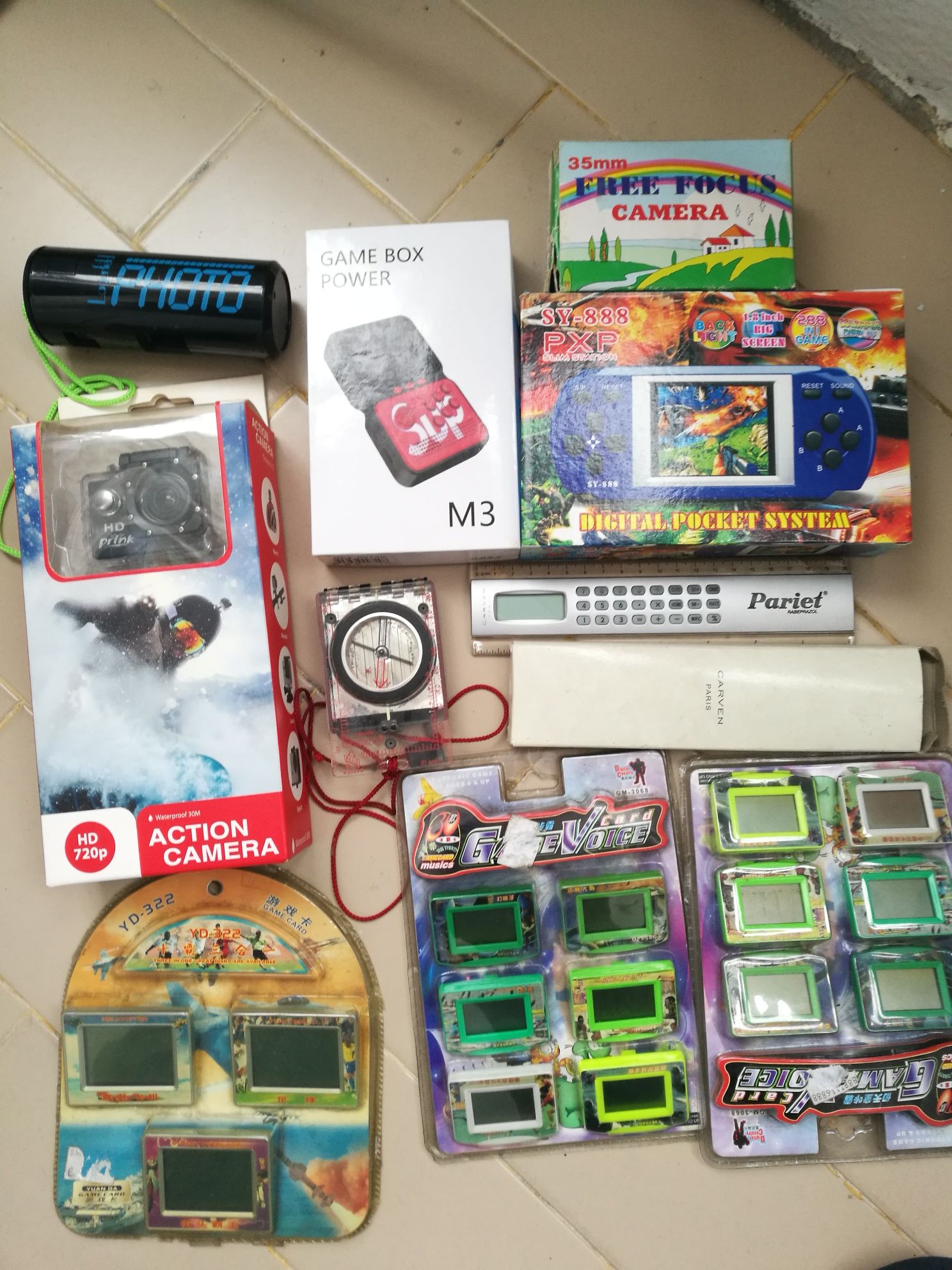 Lote de jogos e câmaras fotográfica