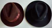 2 kapelusze męskie: 1 czarny Polaris Skoczów oraz 1 brązowy