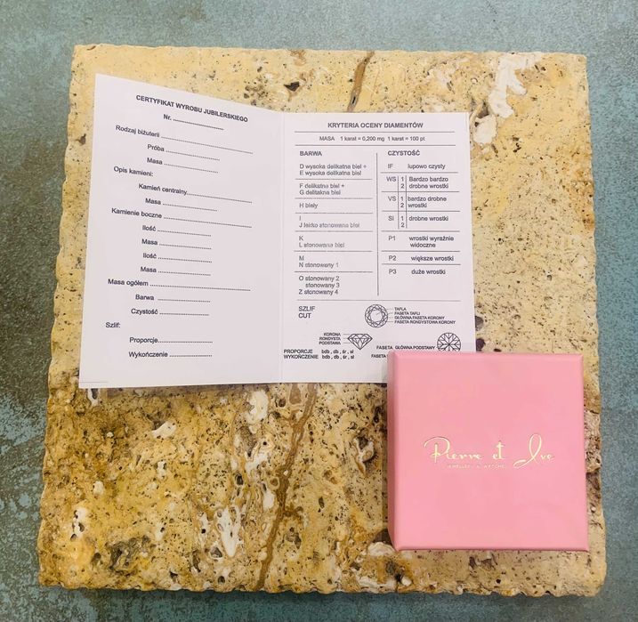 Złoty pierścionek z brylantem 0,10ct