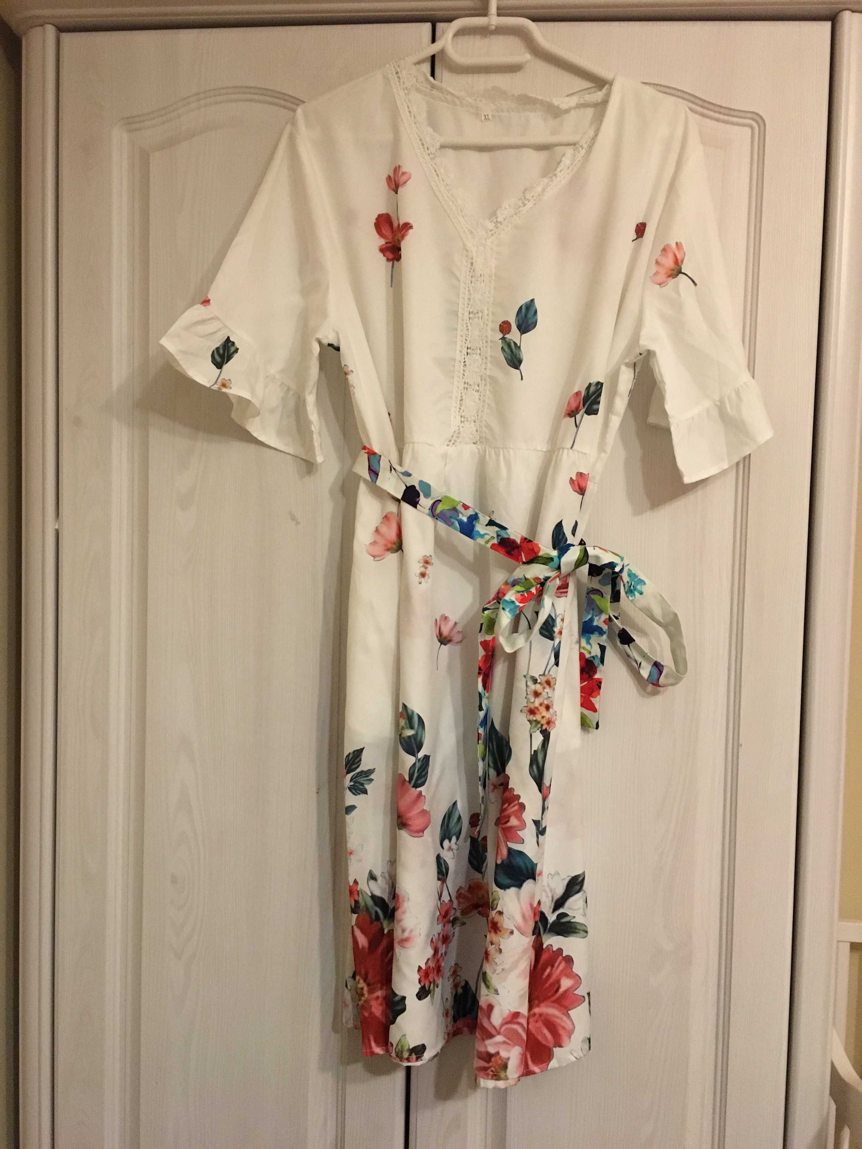 Piękna biała sukienka w kwiaty midi z kieszeniami 42 XL wiosna lato