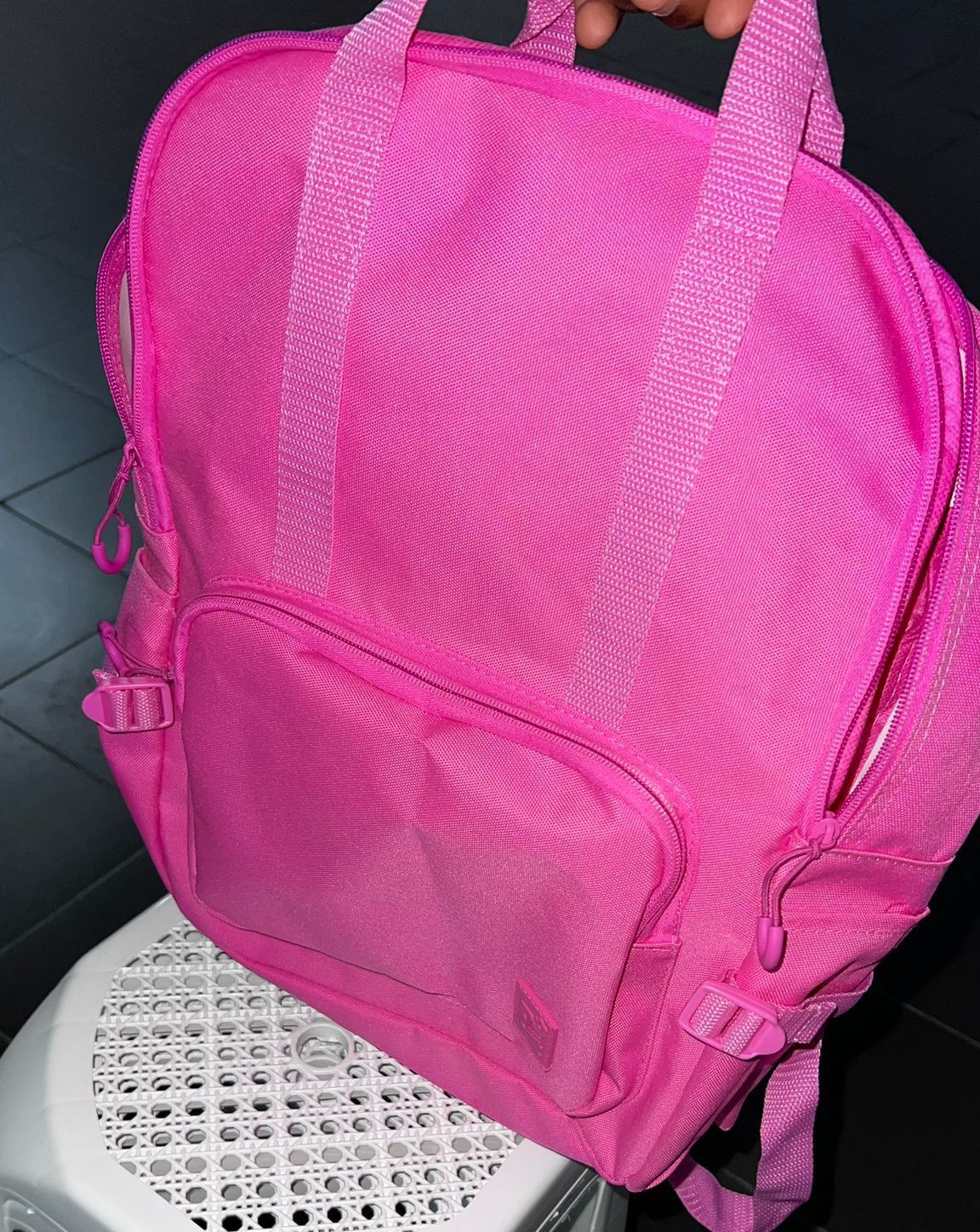 Mochila rosa com bolso