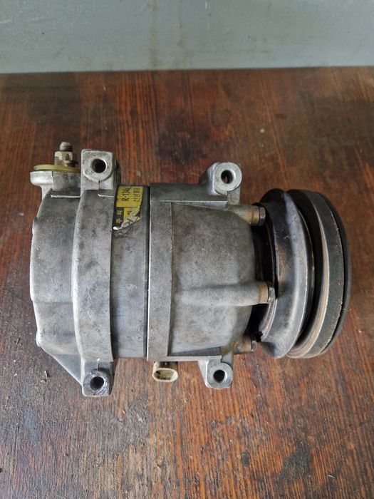 Компрессор кондиционера ланос