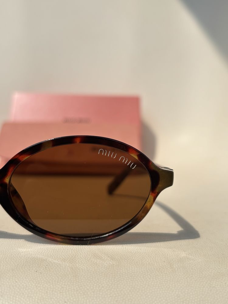 Oculos miu miu lentes castanhas