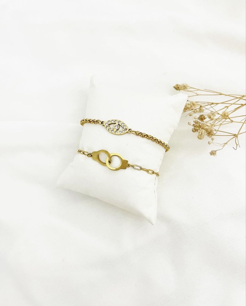 Pulseiras douradas em aço inoxidavel