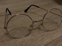Круглі прозорі окуляри