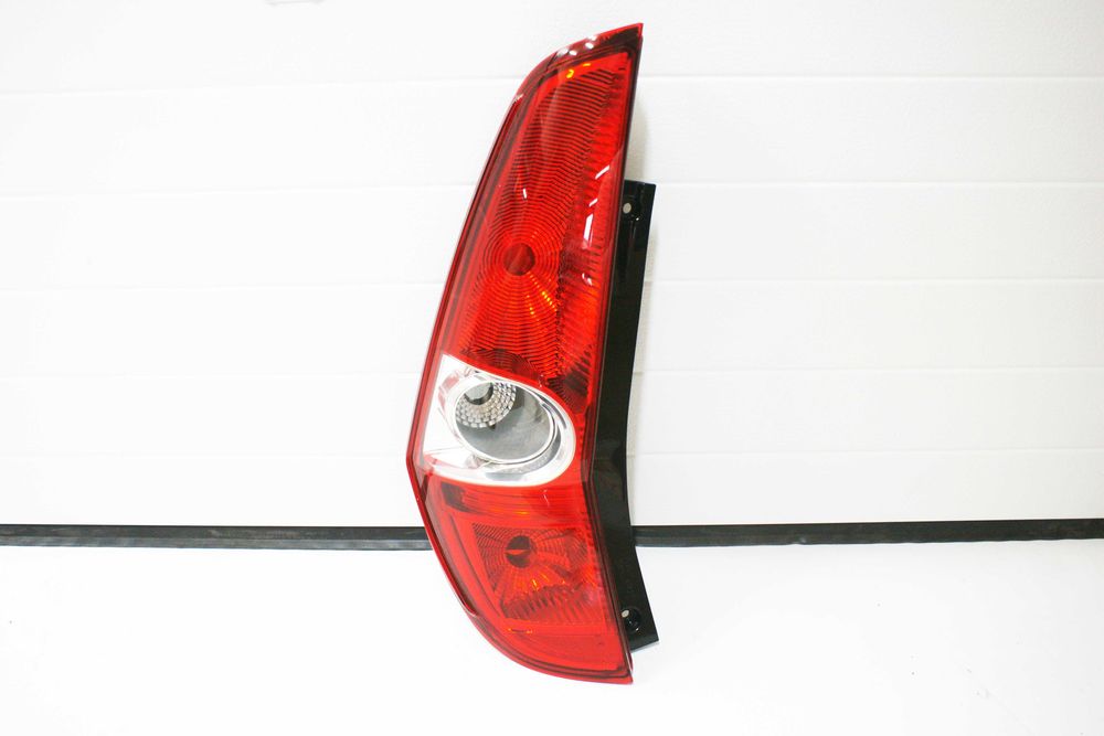 Lampa tył tylna lewa OE Suzuki SPLASH NOWA oryginalna