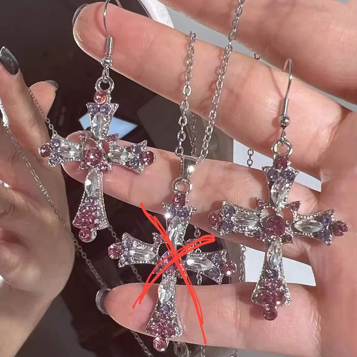 женские серьги кресты