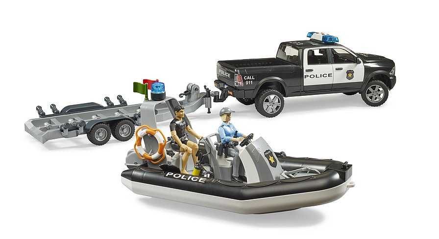 Набір Bruder Поліцейський пікап RAM 2500+ причеп,човен,фігурки (02507)