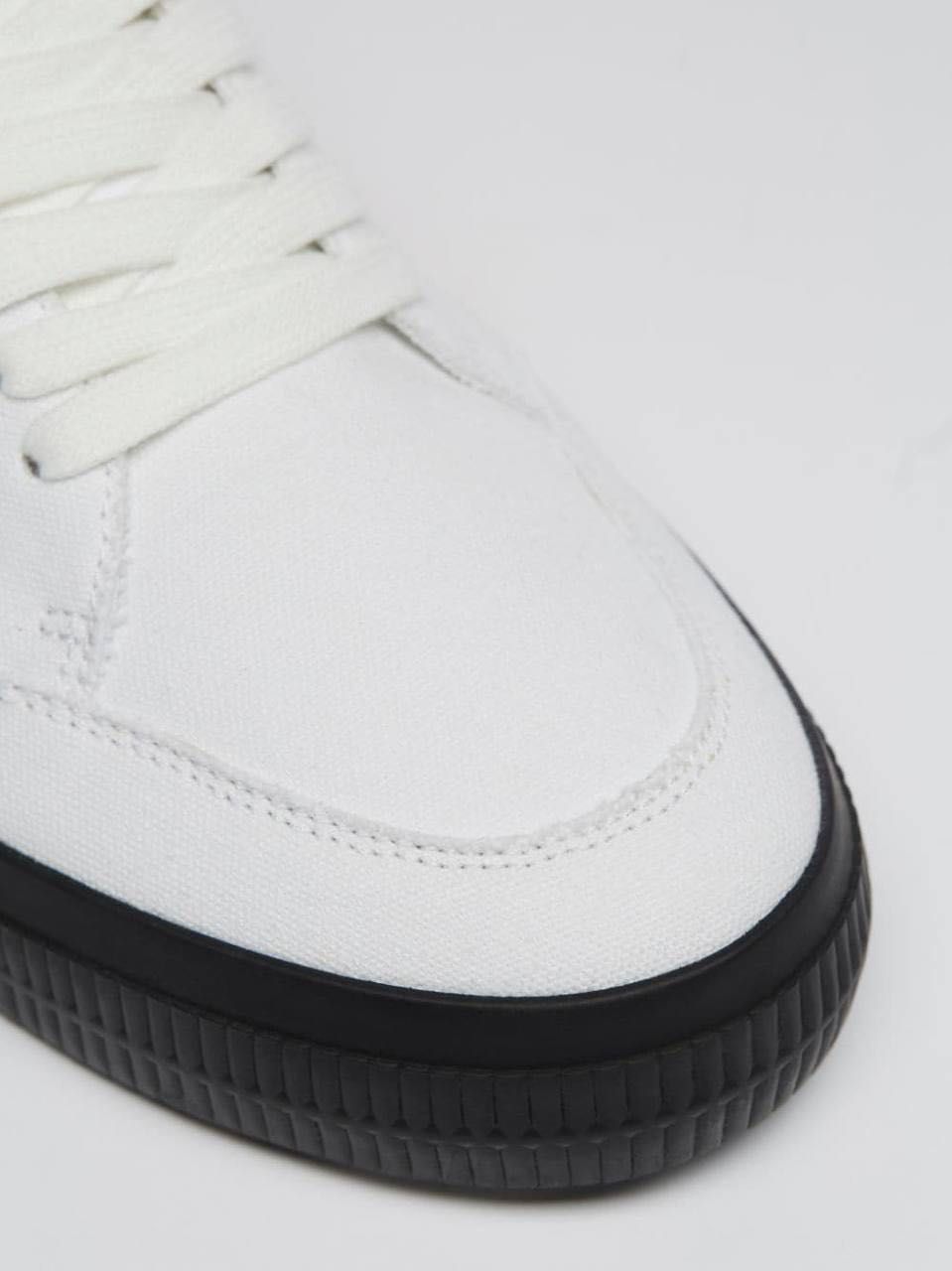 OFF-WHITE
Vulcanised Sneakers