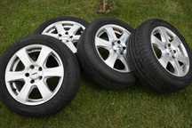 4 koła - felgi Alutec 16 cali z oponami letnimi Goodyear 205/55R16 91V