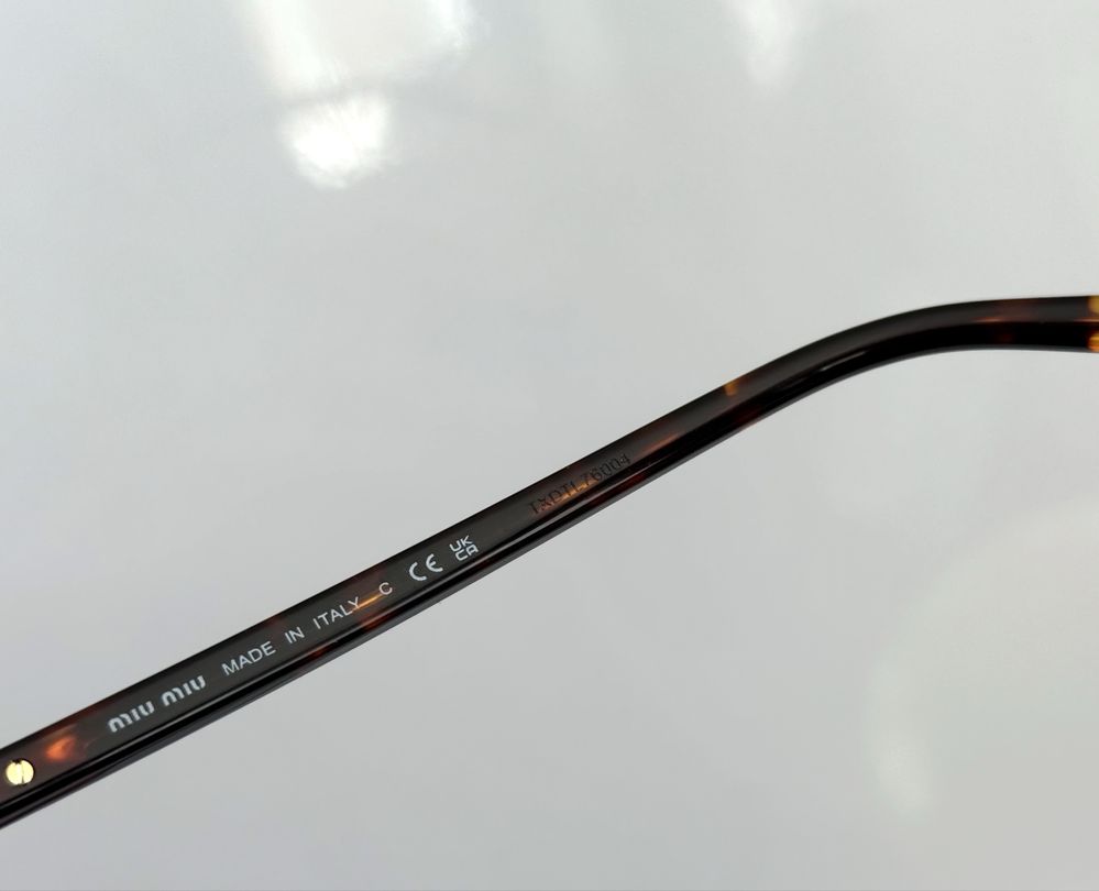 Сонцезахисні окуляри Miu Miu 11ZS 14L20I purple brown оригінал