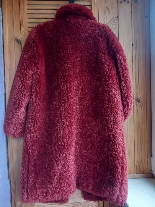 Яскрава шубка з штучного хутра