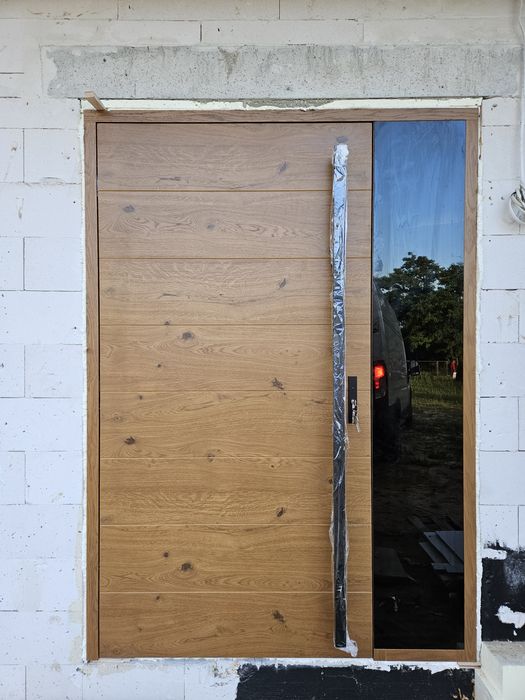 Drzwi zewnętrzne drewniane dębowe ral 3020 z montażem producent