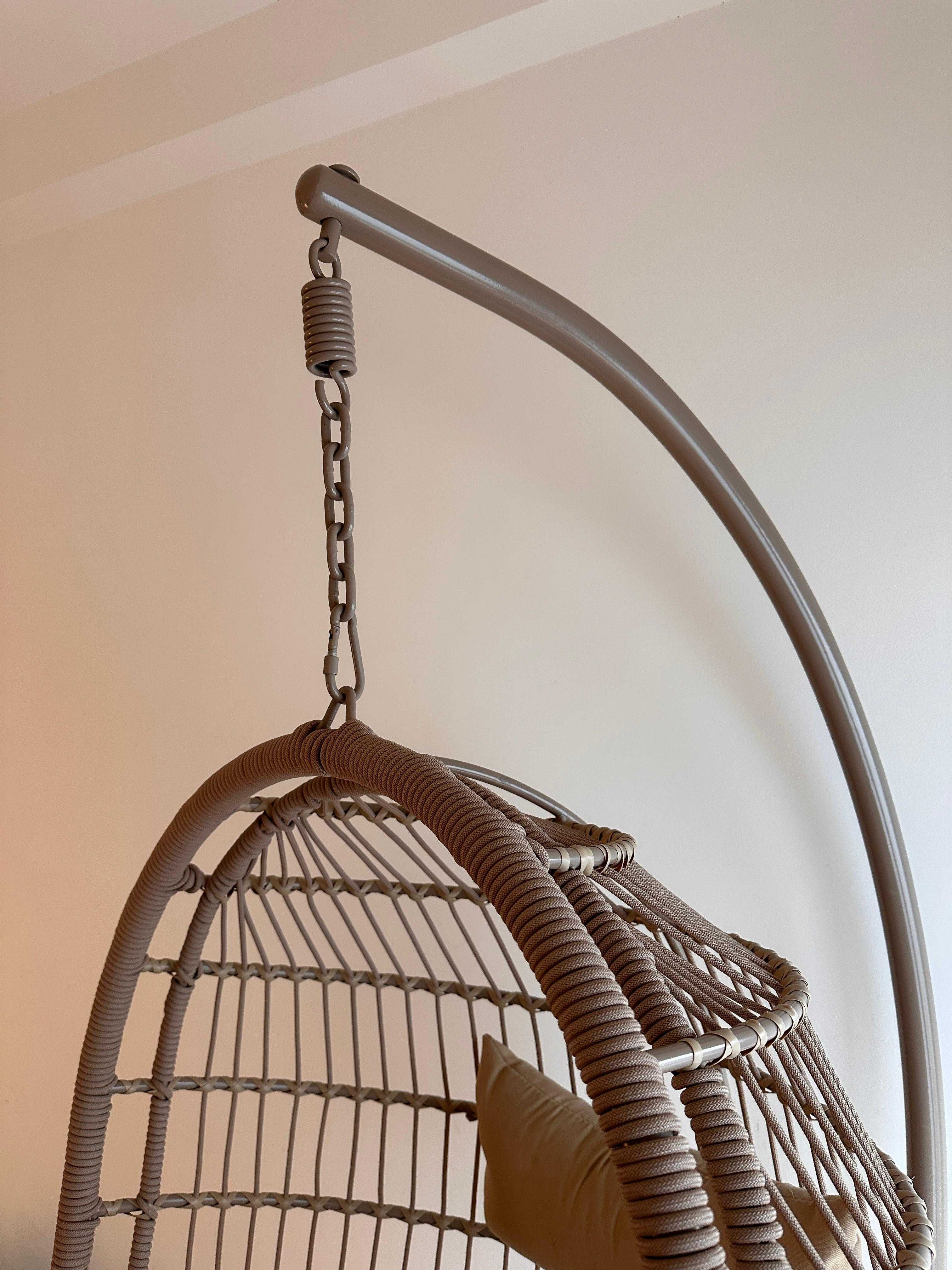 Hanging swing chair with beige/brown structure & cushions