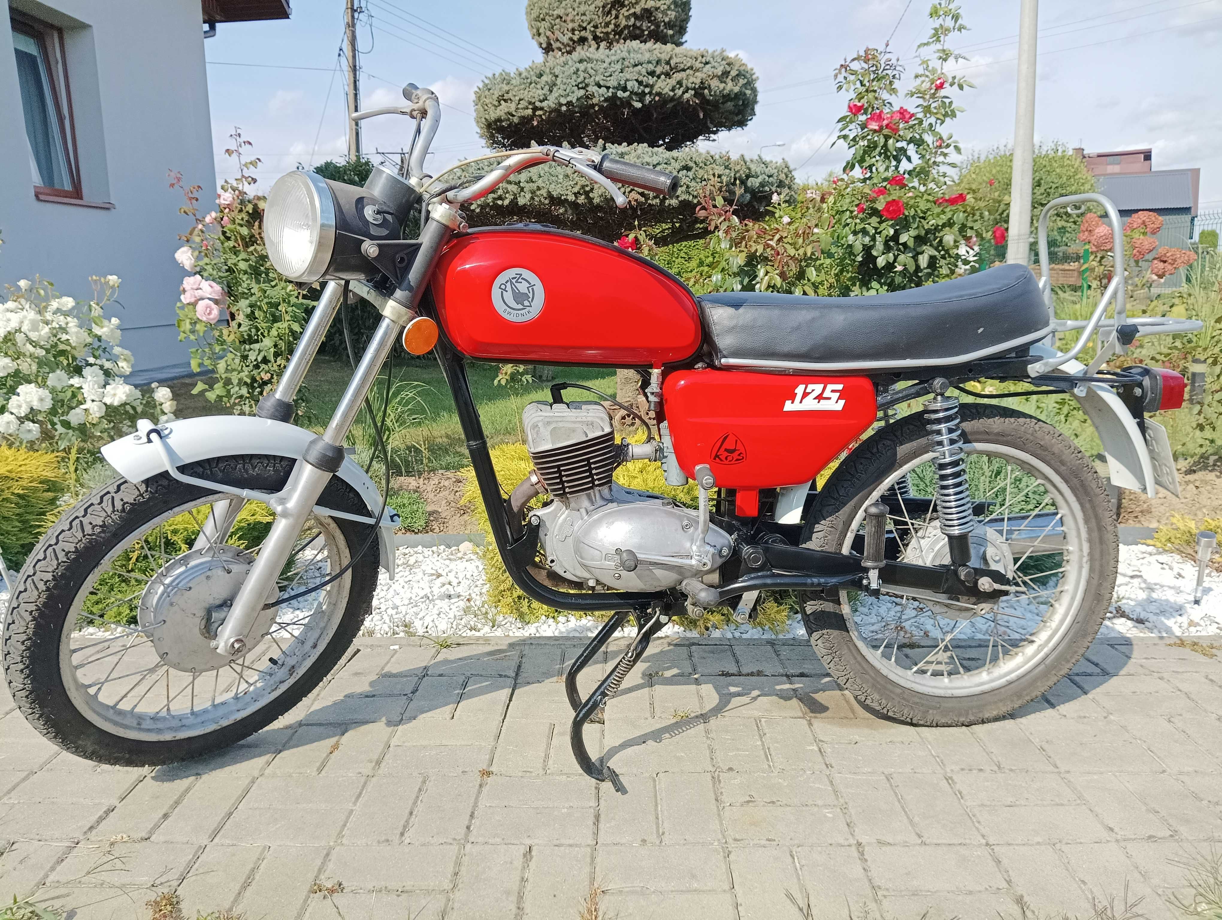 WSK-125 KOS - 1984 - części - bagażnik, amortyzatory, osłona, łańcuch.