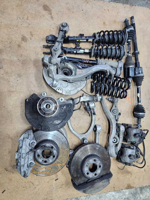 Супорт, полуось,ричаги,ступиця Mercedes W 205