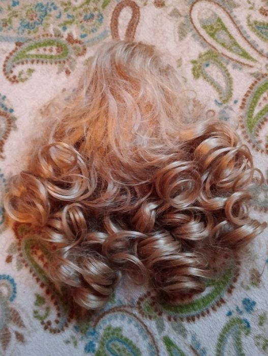 Шиньон, хвіст на заколці