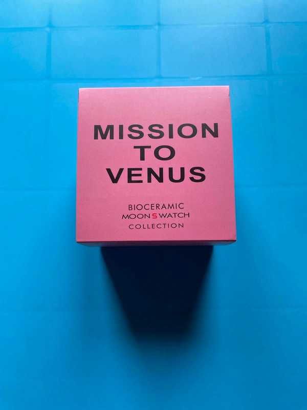 Venus SO33P100 by Omega x Swatch - Coral Glow-In-The-Dark Indices