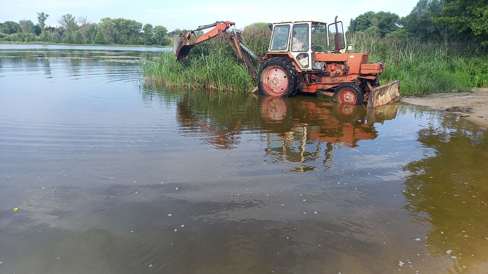 Услуги экскаватора ЮМЗ - малютка