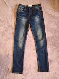 Spodnie jeansowe dla chłopca,rozmiar na 9-10 lat,140