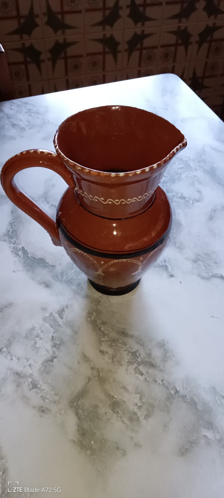 Jarros e caneca de barro
