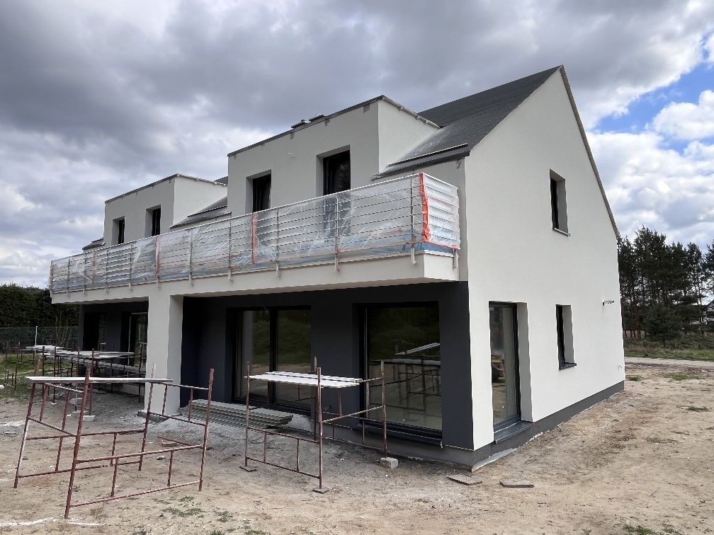 Docieplenia budynków, Elewacje, tynk natryskowy