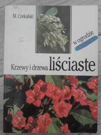 W ogrodzie_krzewy i drzewa liściaste _ogród_ogrodnik_działka