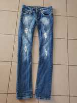 Cieniowane obcisłe jeansy skinny niskim stan rurki 36 przecierane