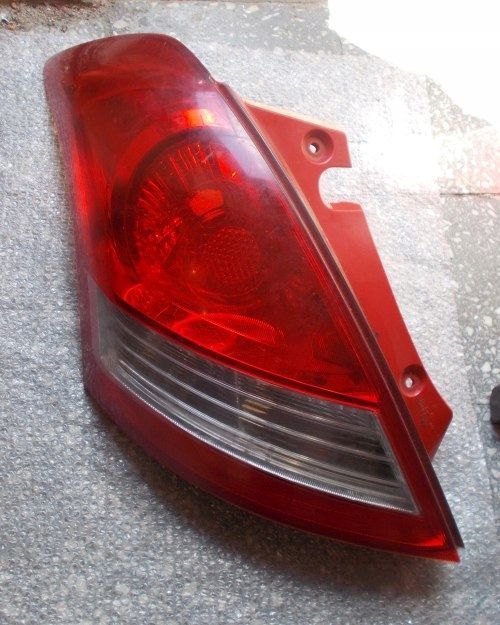 SUZUKI SWIFT MK7 SPORT 10- LAMPA TYLNA LEWA EUROPA ORYGINAŁ