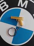Brelok do kluczy zloty pistolet