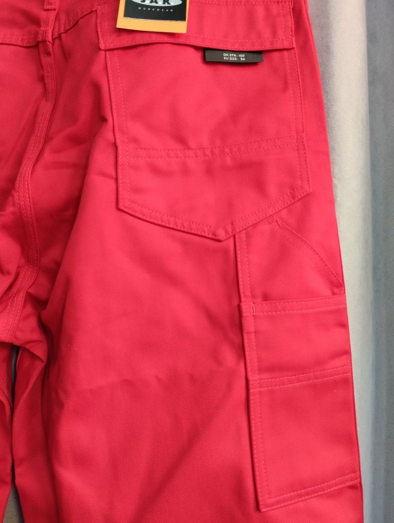 Nowe spodnie robocze czerwone rozm. 100 (pas), L/XL/56