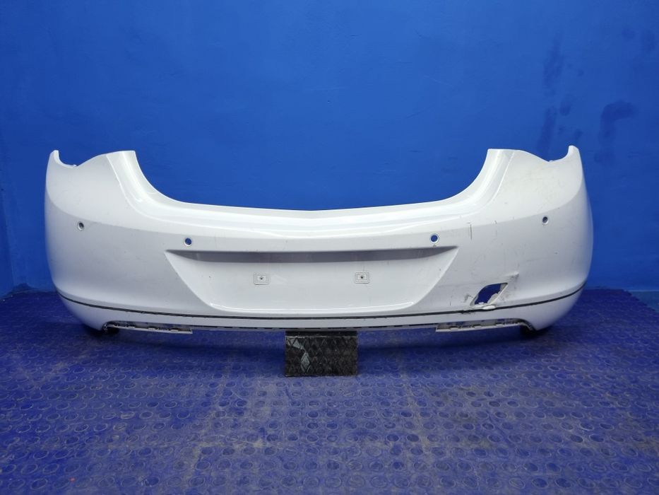 ZDERZAK tylny OPEL Astra J tył 4 PDC Oryginał