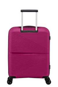 Używana różowa walizka