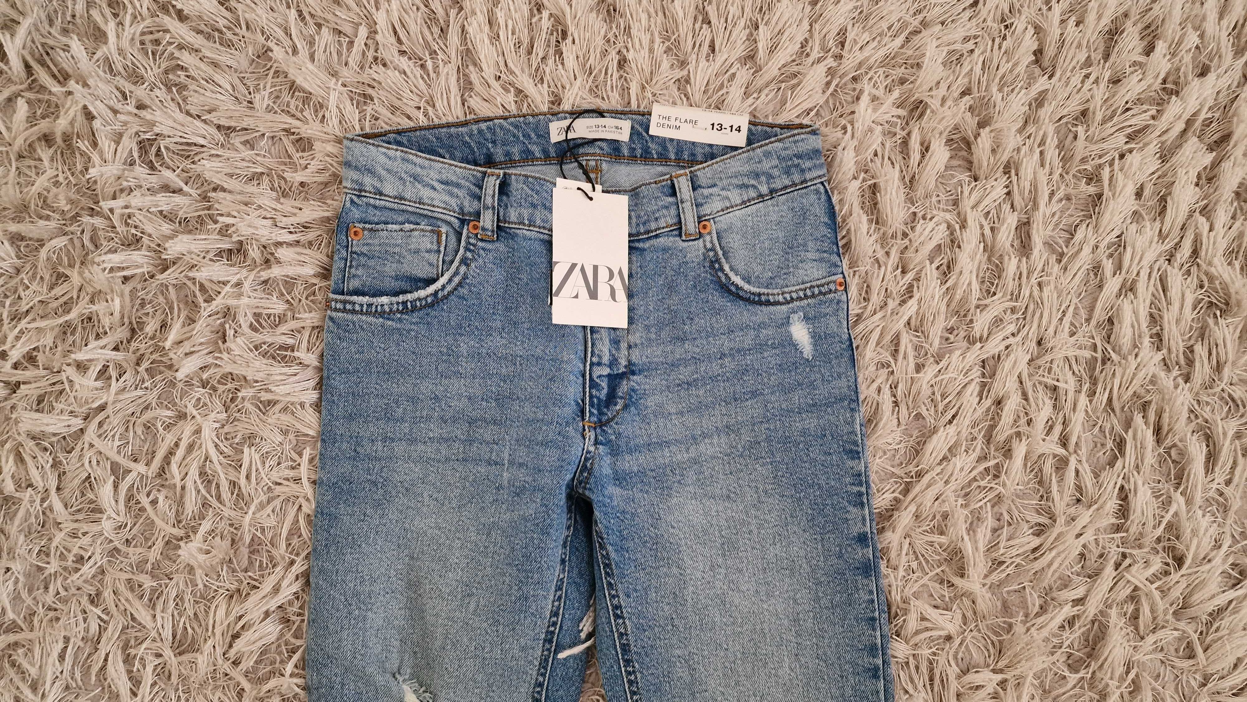Zara spodnie jeansy flare z przetarciami / rozdarciami 164 cm zara