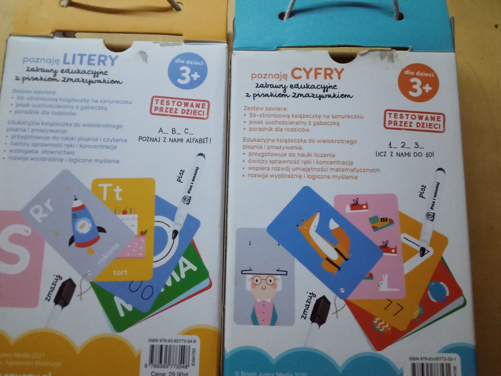 Edukacyjne książeczki do wielokrotnego pisania litery i cyfry