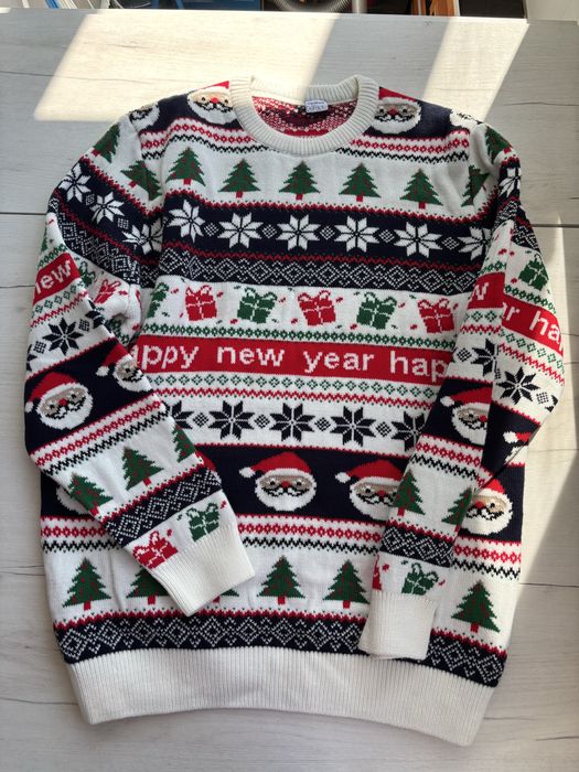 Новорічні світера від Defacto