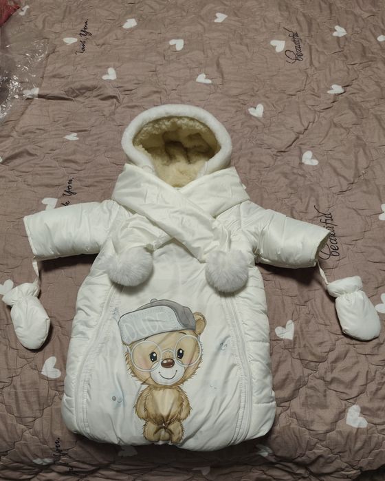 Продам зимовий конверт на овчині.