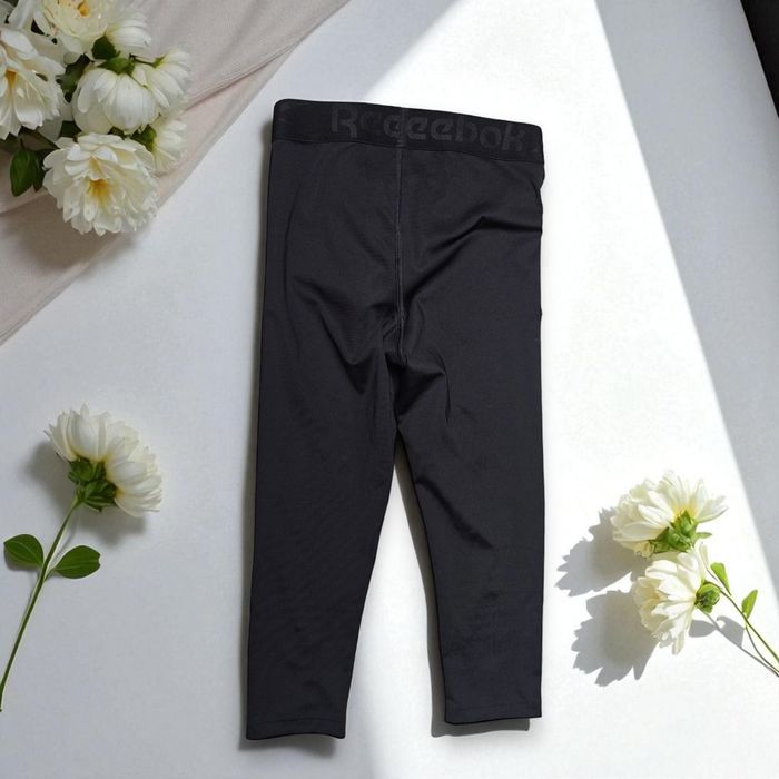 Czarne legginsy damskie Reebok kolarki sportowe rybaczki