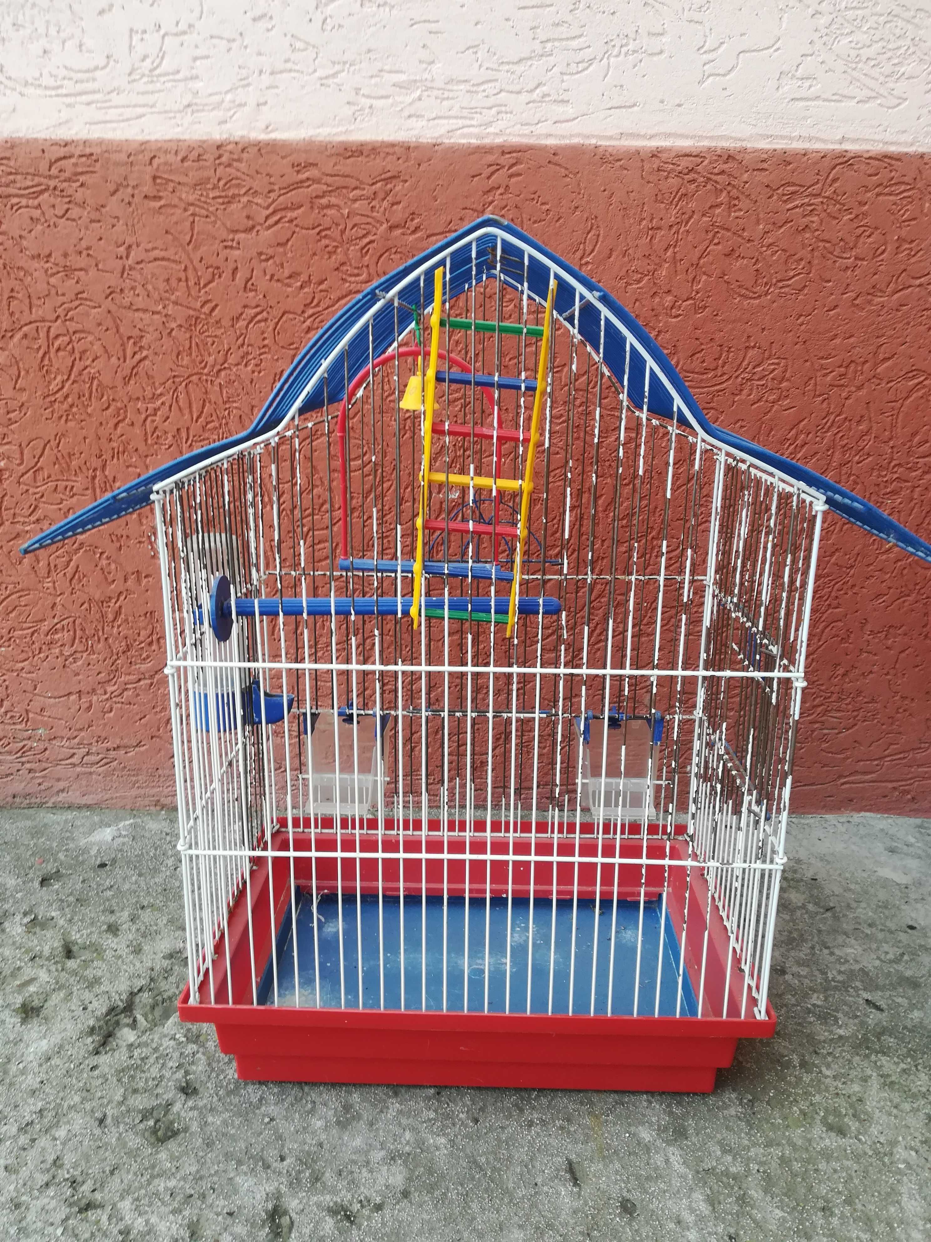 Клітка для маленького попугая