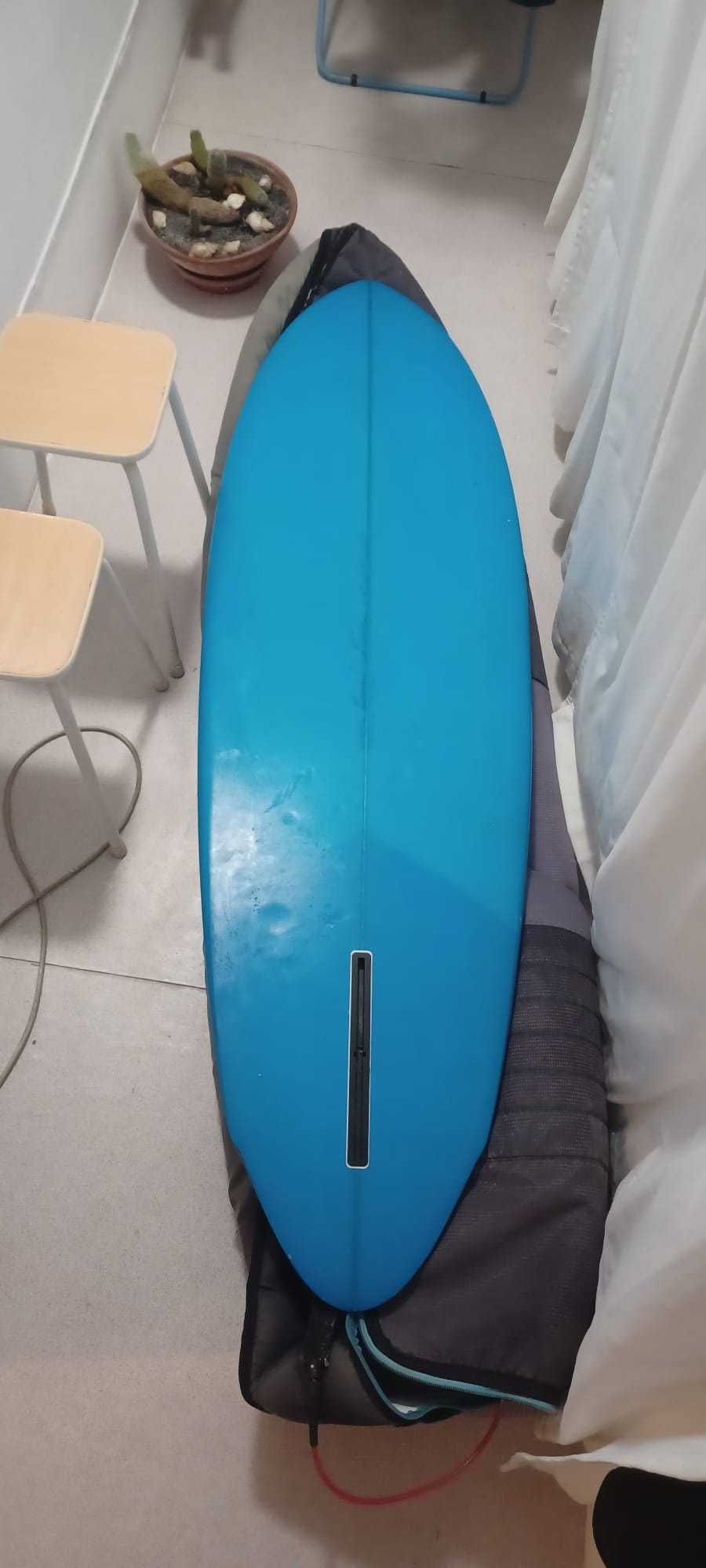 Prancha de single fin (6'4")