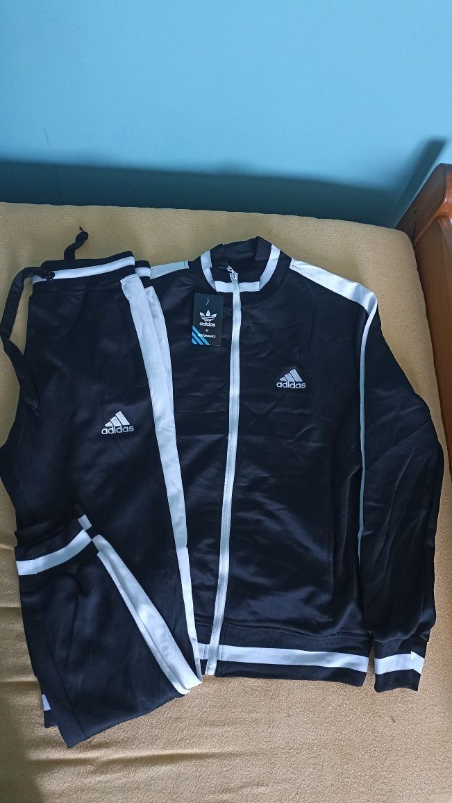 Komplety dresowe damskie i męskie. S.M.L.XXL. 3XL