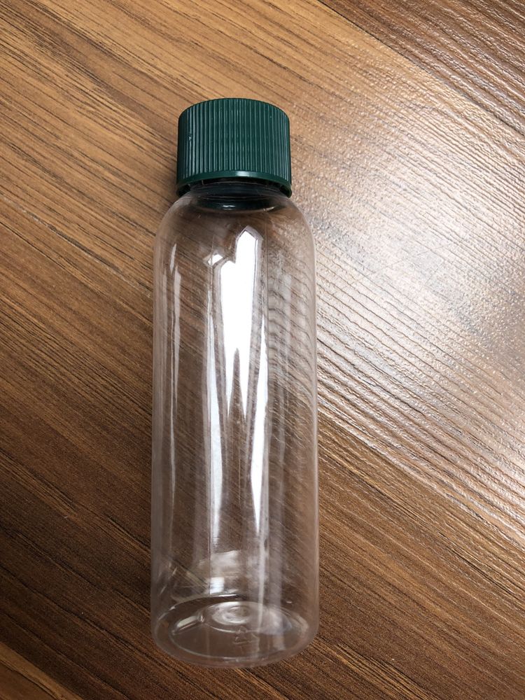 Butelka turystyczna na kosmetyki 100 ml z nakrętką plastikową zieloną