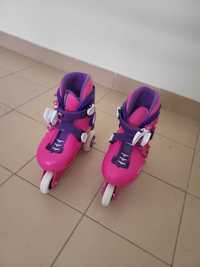 Patins em linha cor-de-rosa