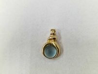 Złoty wisiorek damski/ 750/ 5.87 gram/ Topaz błękitny