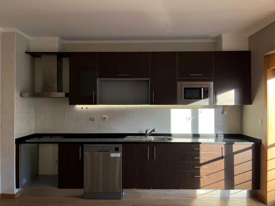 Cozinha com tampo de granito