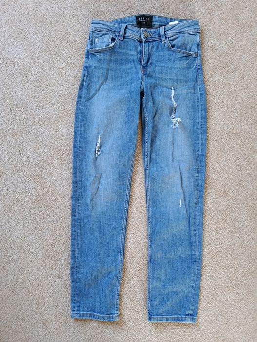 Spodnie jeansowe z dziurami mohito rozm 32