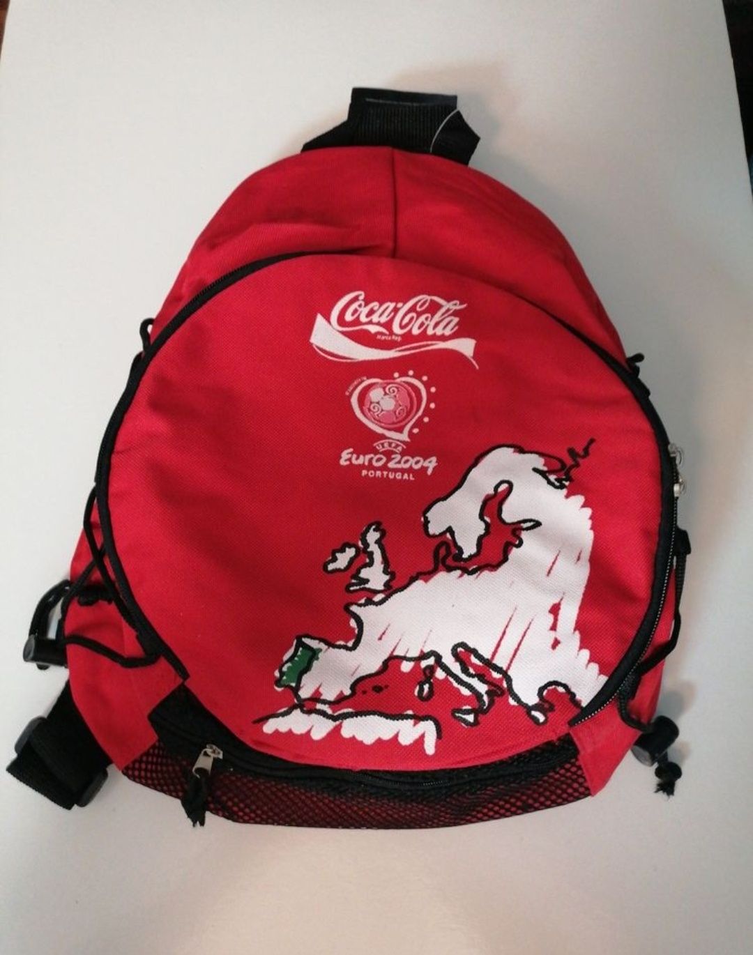 Mochila em tecido com publicidade da Coca-Cola, aquando do Euro 2004