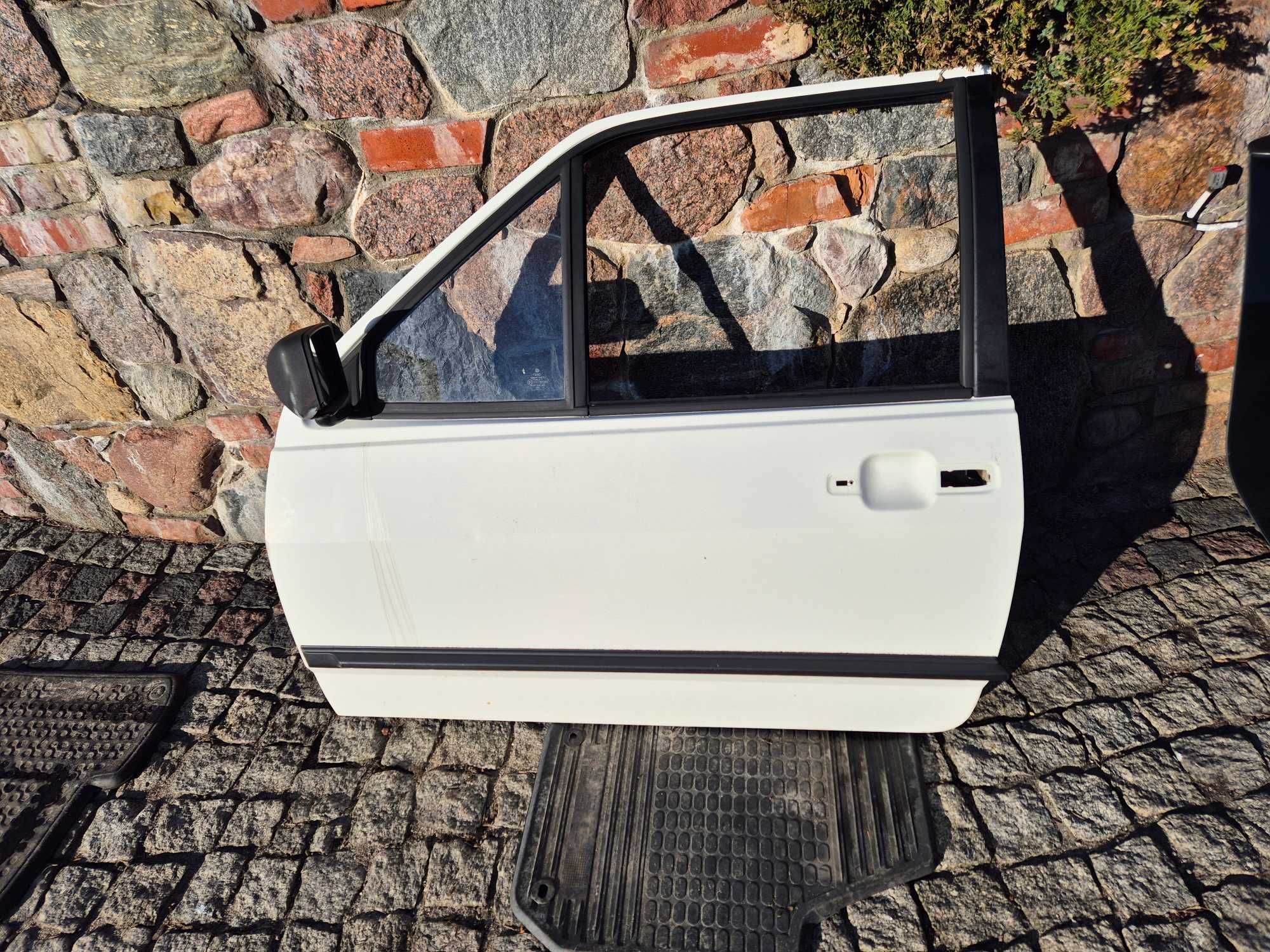 drzwi przednie lewe lewy przód vw polo II coupe 3 drzwi oryginał igła
