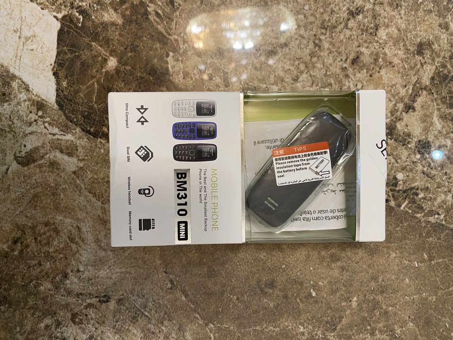 Є в наявності ! Міні телефон розміром пелець SERVO BM310