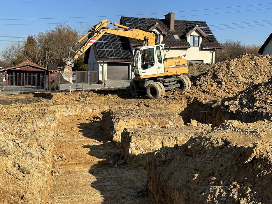 Wynajem koparki obrotowej kołowej Liebherr usług koparką